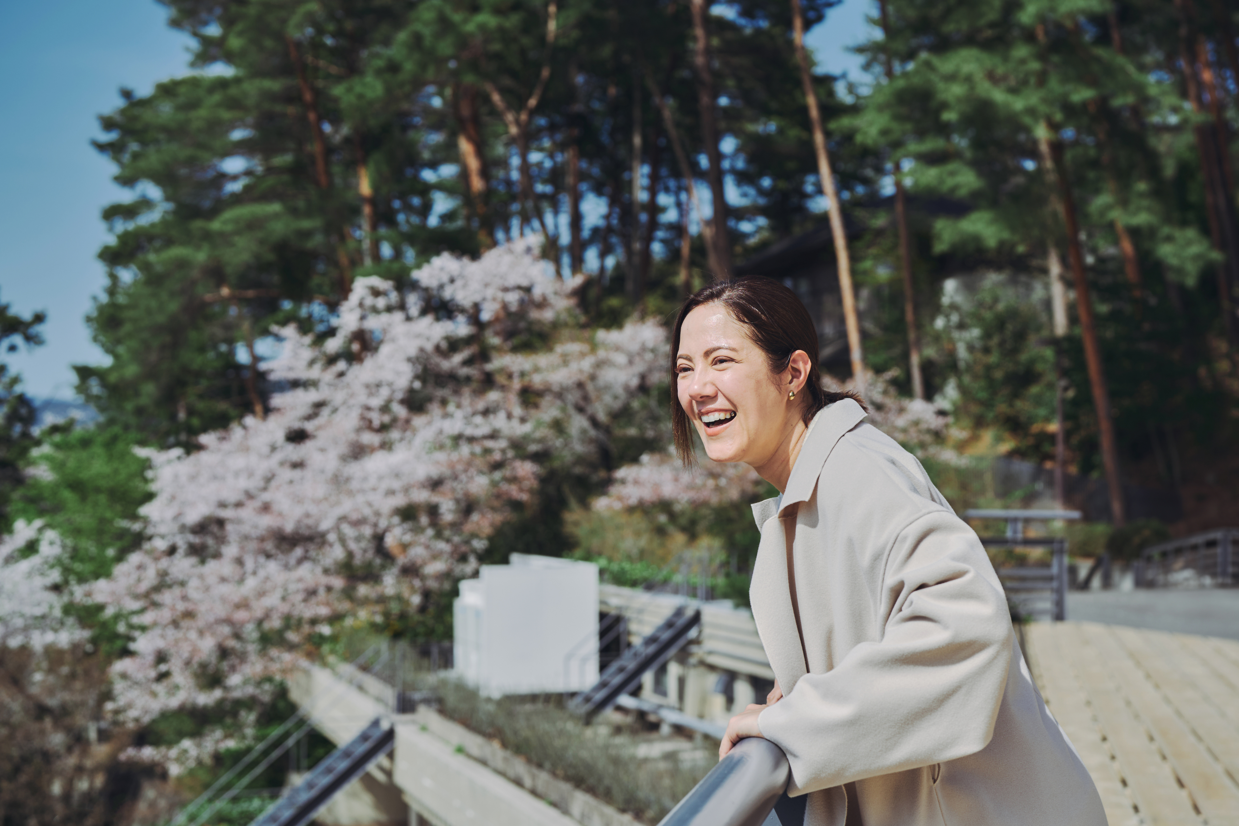 Photo of a study hall with wooden tables and chairs.